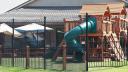 Playground Progress(4) - New playground complete with fencing and netting to keep the kids safe